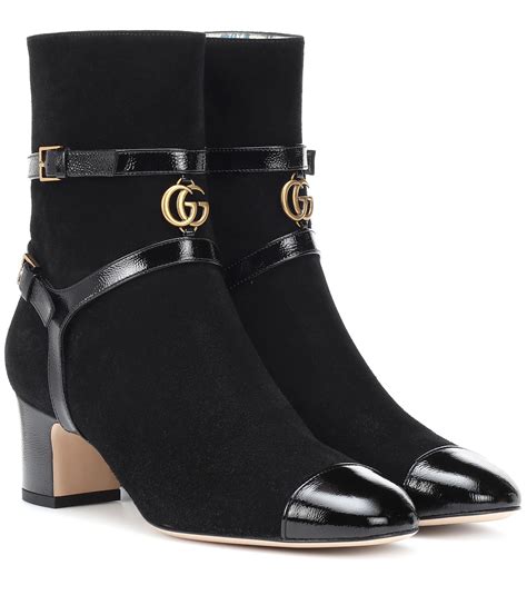 black and gold gucci boots|all black gucci boots.